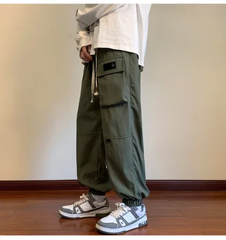 Pamuklu pantolonlar Harajuku Tarzı Sweatpants 2023 Bahar Yeni MenBig Cepler Gevşek Pantolon Erkek Hip Hop Kargo Pantolon harem pantolon